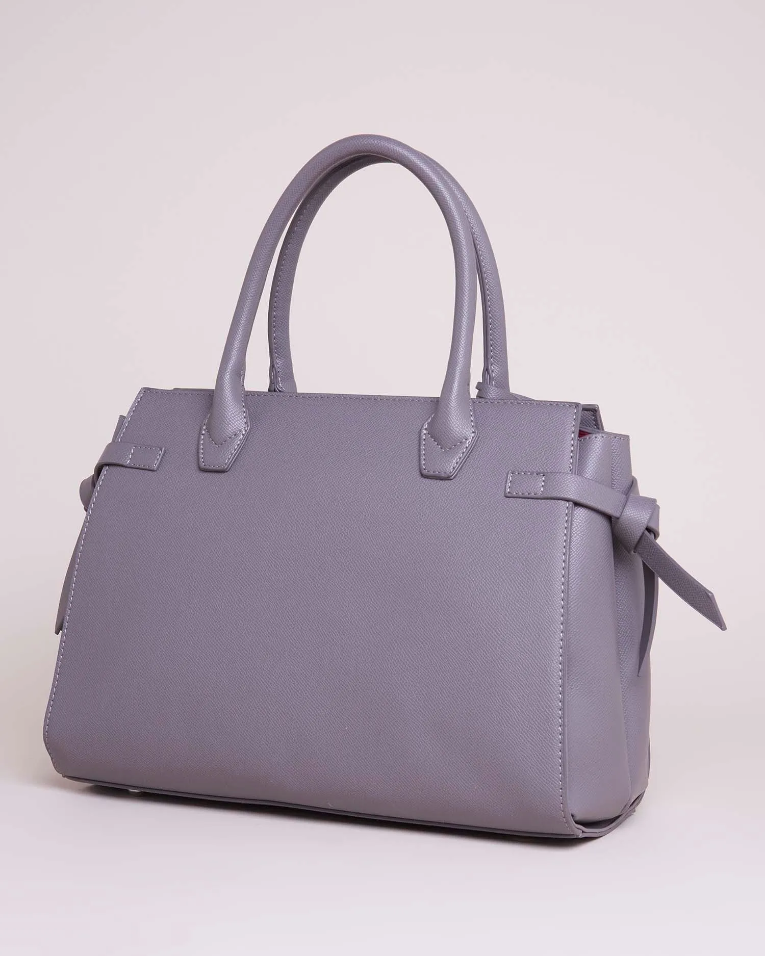 Handbag with outer pocket